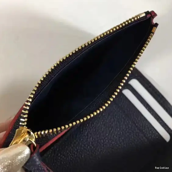 Repladies offers premium fake Louis bags at unbeatable prices. Our products are cheap because we focus on direct sales Louis Victorine wallet Vuitton 0404